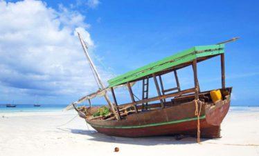 Zanzibar White Sandy Beach with a Dhow